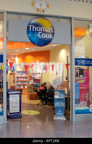 Thomas cook travel agent agency foreign holiday flight airline booking ticket arndale centre Manchester display inexpensive mark Stock Photo