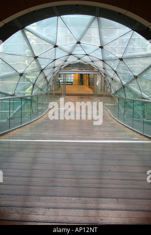 Glass connecting tunnel bridge arndale Selfridges marks spencer  tube tubular I r a reconstructed reconstruction Manchester UK G Stock Photo