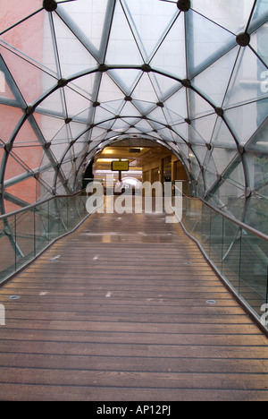 Glass connecting tunnel bridge arndale Selfridges marks spencer  tube tubular I r a reconstructed reconstruction Manchester UK G Stock Photo