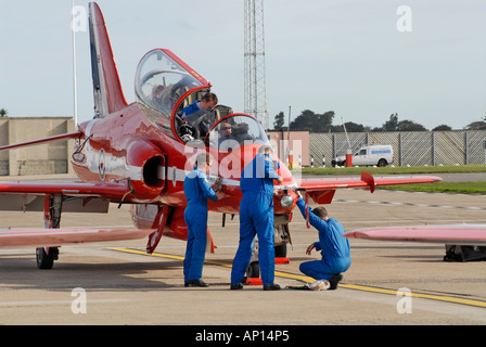 Ground crew prepare the Hawk aircraft for the RAF display team the Red Arrows at the Jersey International Air Display Stock Photo