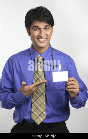 ANG200107 Executive with Identity card around neck Stock Photo