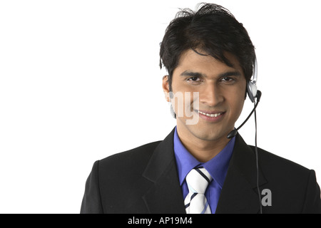 ANG200133 Executive with microphone and headphone Stock Photo