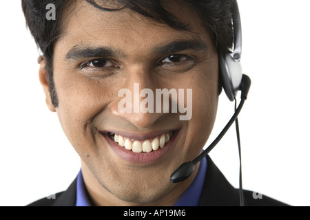 man with microphone and headphone on white background Stock Photo