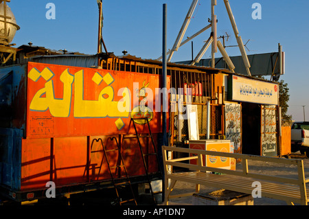 Early morning view of roadside store baqala in Kuwait on isolated desert road to Saudi Arabia Stock Photo