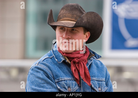 Cowboy herds longhorn cattle as part of Chrysler promotion at Detroit auto show Stock Photo