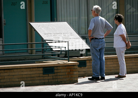 Visitors view memorial plaque commemorating Dr Martin Luther King Jr Lorraine Motel Memphis USA Stock Photo