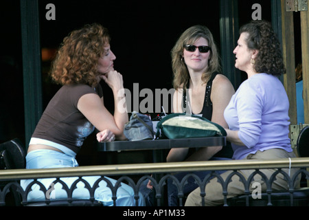 Three women on restaurant outside terrace Beale Street Memphis USA Stock Photo