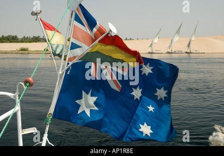 Aussie flag and Three Feluccas anchored beside an island, Nile River, Aswan, Egypt, Middle East. DSC 4348 Stock Photo