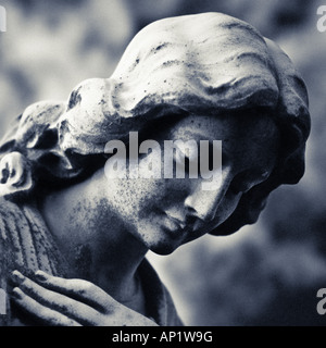 Close-up of an angel headstone in the cemetery at St. Tudno's Church, Llandudno, North Wales, UK Stock Photo