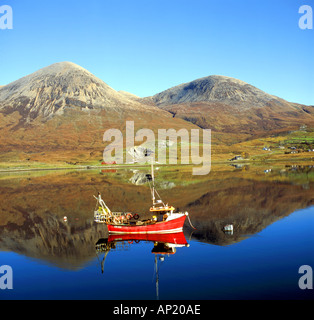 Fishing boat anchored in Loch Slapin Skye Stock Photo