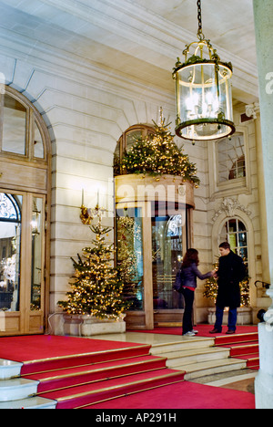 Paris France, Luxury Hotel Ritz, 'Place Vendome' Front Entrance Lit up at night '5 Star', exterior People Stock Photo