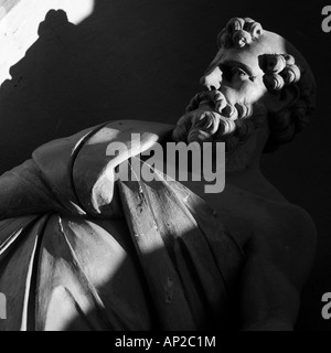 A statue of a bearded man in Badalucco, Italy Stock Photo