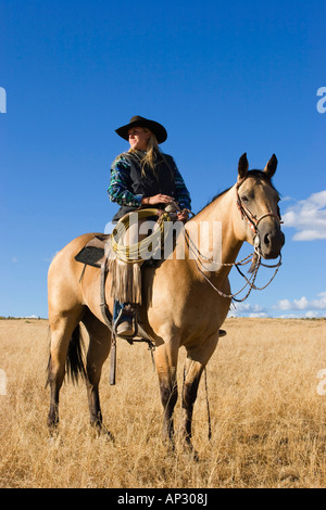 Cowgirl with horse, Oregon, USA Stock Photo - Alamy