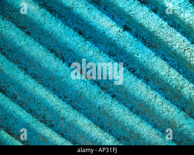 Old corrugated marine blue fibre glass sheet Stock Photo