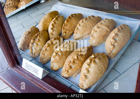 Genuine Cornish pasties in a baker s shop window Stock Photo