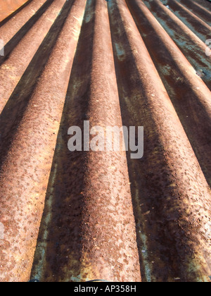 Rusty corrugated metal surface. Abstract background texture. Stock Photo