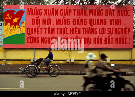 Communist Propaganda Billboard on street of Hue, Vietnam Stock Photo