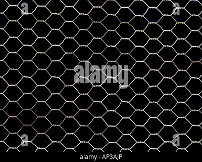 Old, rusty metal net isolated on black Stock Photo