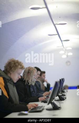 Students working on computers in the Uni Lounge, University, Ludwig Maximilians Universitaet, Munich, Bavaria, Germany Stock Photo