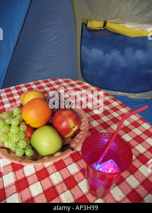 Bowl of Fruit on Red and White checkered Tablecloth Stock Photo