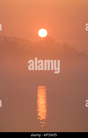 Misty Sunrise over Hickling Broad Norfolk UK