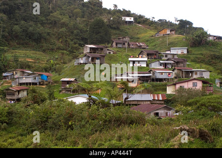 A settlement of native Orang Asli people into Kampung style huts in Pahang State, Malaysia. Stock Photo