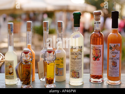 Bottles of Italian liqueur on display, Cinque Terre, Italy Stock Photo