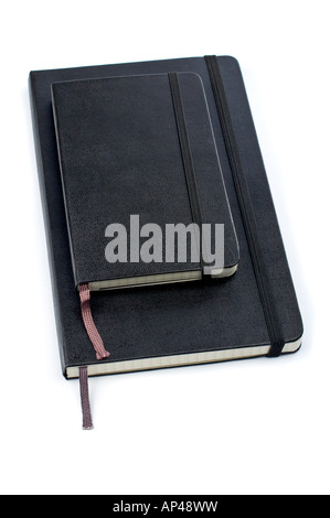 Two blacks notebooks with soft shadow on white background Stock Photo