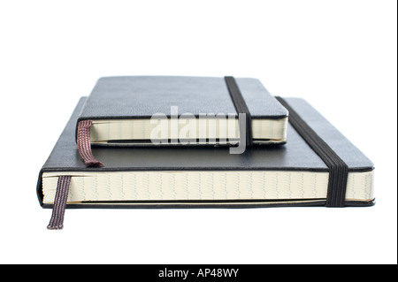 Two blacks notebooks with soft shadow on white background Stock Photo