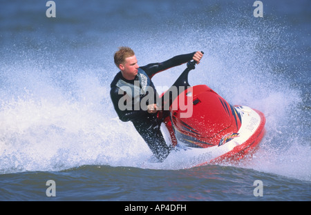 Young Man Riding Jet Ski Stock Photo