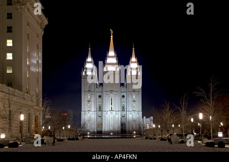 SLC LDS Temple. Night photo with church HQ on right and Hotel Utah on Left. Church of Jesus Christ of Latter-Day Saints Stock Photo