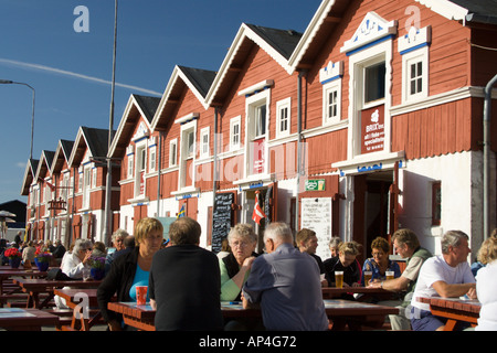 People sitting outside restaurants at Skagen harbour in Jutland, Denmark Stock Photo