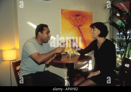 Two people talking in a restaurant Stock Photo