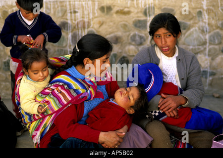 Peru Paucartambo indian women children traditional people family Stock Photo