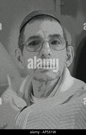 Portrait of an old man wearing eyeglasses. Captured infrared. Painting effect added in PC Stock Photo