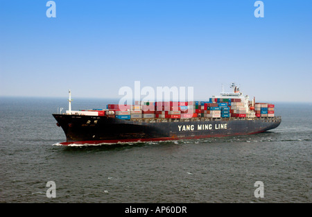 A container ship entering New York harbour New York city USA Stock Photo