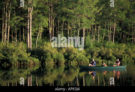 Freedom, NH Fly-fishing from a canoe in Trout Pond. Part of future town forest. (MR) Stock Photo