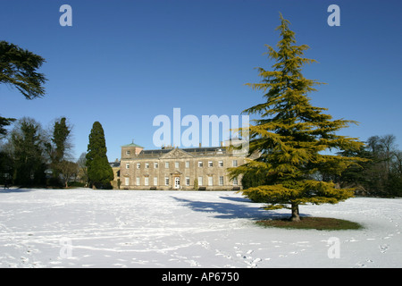 The mansion house and surrounding park of Lydiard Tregoze in the snow Stock Photo