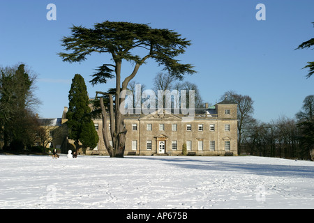 The mansion house and surrounding park of Lydiard Tregoze in the snow Stock Photo