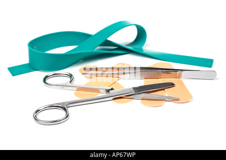 Medical scissors elastic rubber tweezers and adhesive bandages Shallow DOF Stock Photo