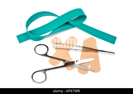 Medical scissors elastic rubber tweezers and adhesive bandages Stock Photo