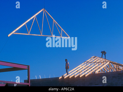 two men working on roof construction Stock Photo