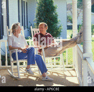mature couple relaxing on porch Stock Photo
