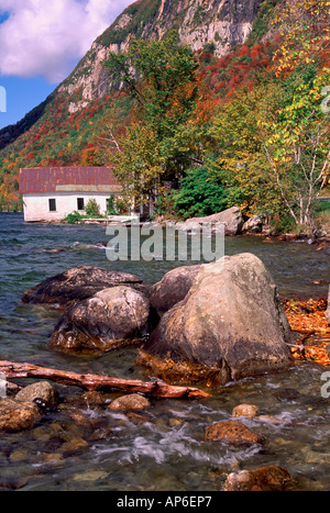 USA, Vermont, Lake Willoughby, House and autumn hillside at lakeside Stock Photo