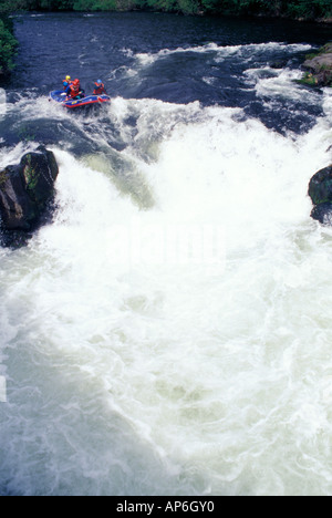 Rafters taking the plunge at Husum falls, on the White Salmon River, in Washington. (MR) Stock Photo