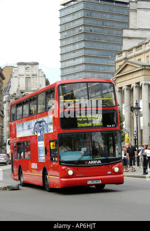 Arriva double decker bus travelling by entrance to Leicester station ...