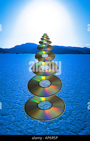 Compact discs flying in the desert, digital composite Stock Photo