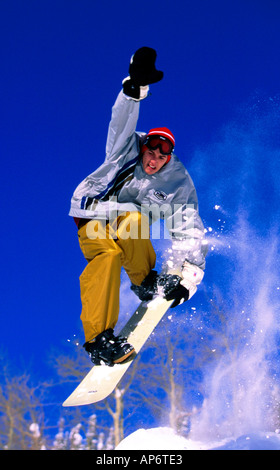 Jumping in mid-air, snowboarding action, Vail, Colorado Stock Photo