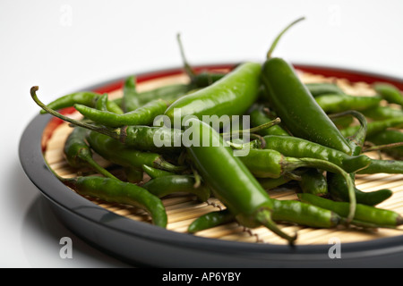 fresh green chili pepper on white background Stock Photo - Alamy