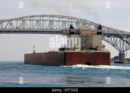 Giant lake freighter travel on the Great Lakes to provide shipping of product Stock Photo